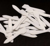 A bunch of cosmetic spatulas white angled beauty makeup mixing tool