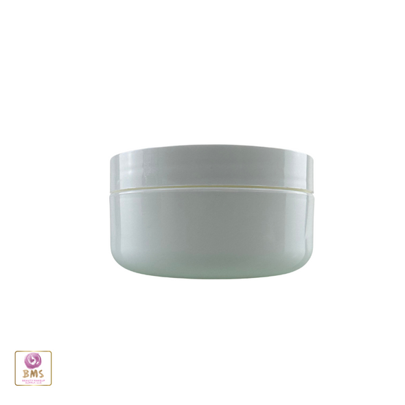 A white cosmetic jar with the lid screwed onto the jar to be used for cosmetic and skincare products.