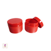 Two red cosmetic jars one with the lid closed and the other one with its cap sitting on the side